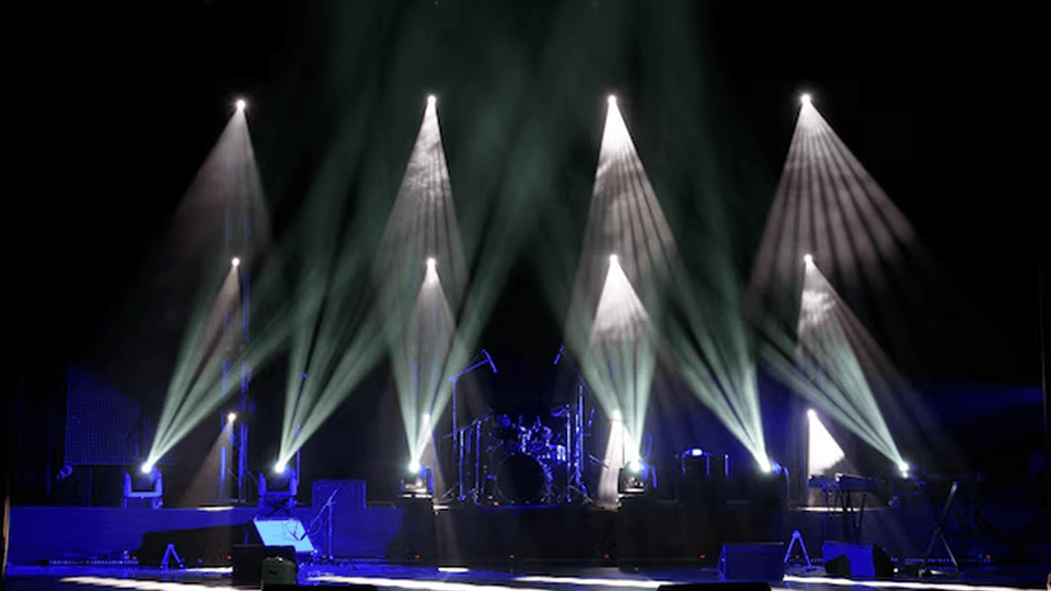 Layered fixture placement creating depth across a live stage