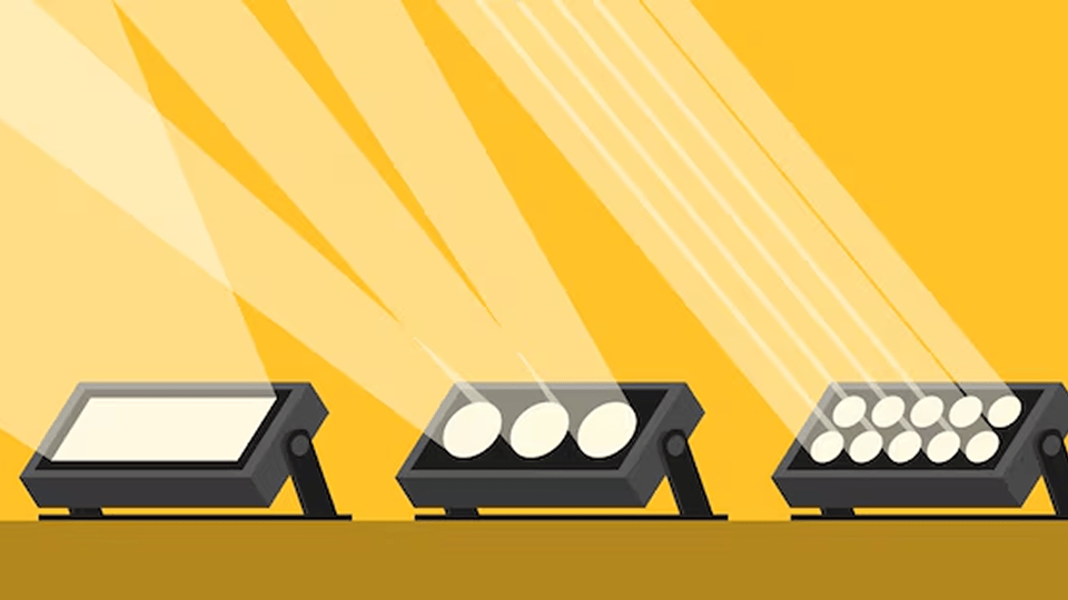 Beam light fixtures on a mid-size venue stage